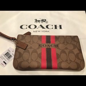 NWT New COACH Varsity Lg Wristlet F66463 pink tan